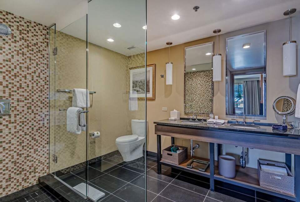 Large master bathroom with walk in tiled shower