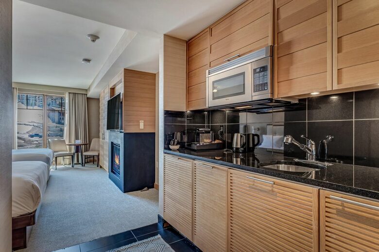 Suite with fireplace and kitchen access