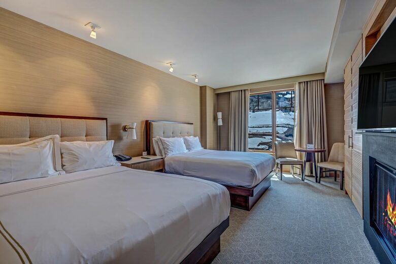 Suite with 2 queen beds, fireplace and mountain views
