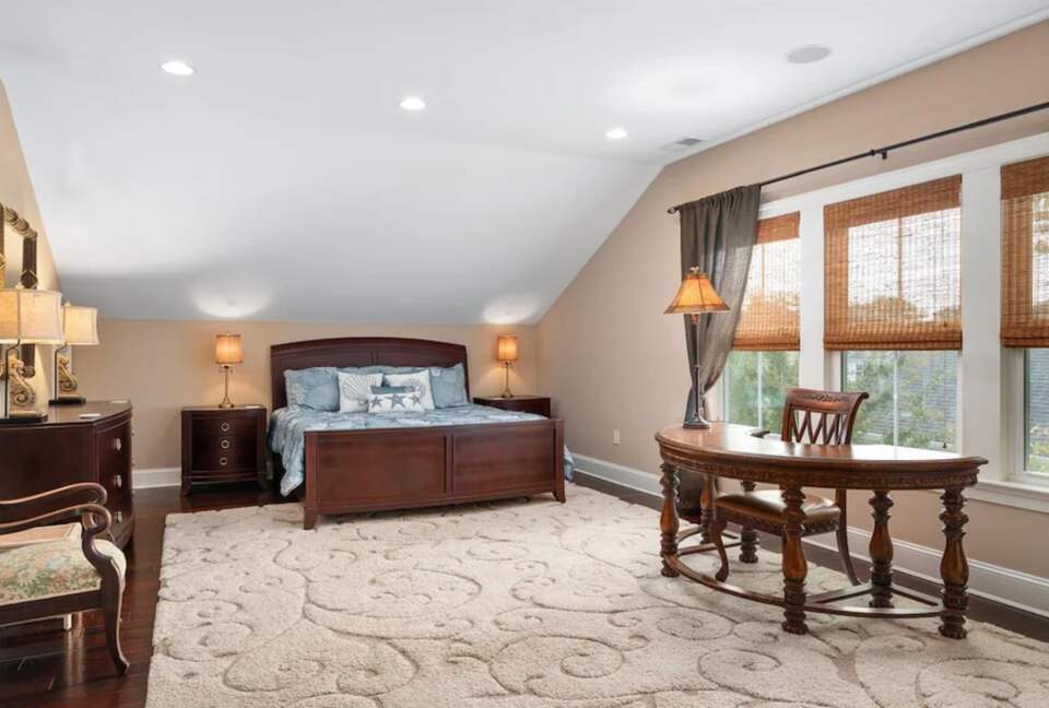 Large bedroom with bonus sitting area