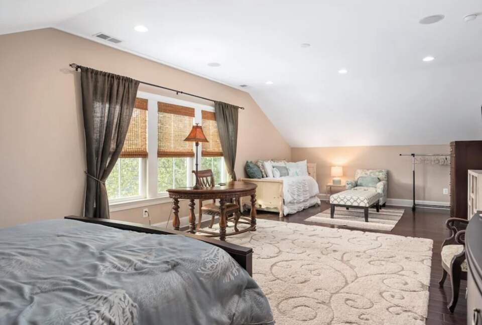 Large bedroom with bonus sitting area