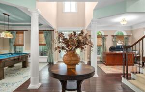 Main living area combining entertainment with a home office