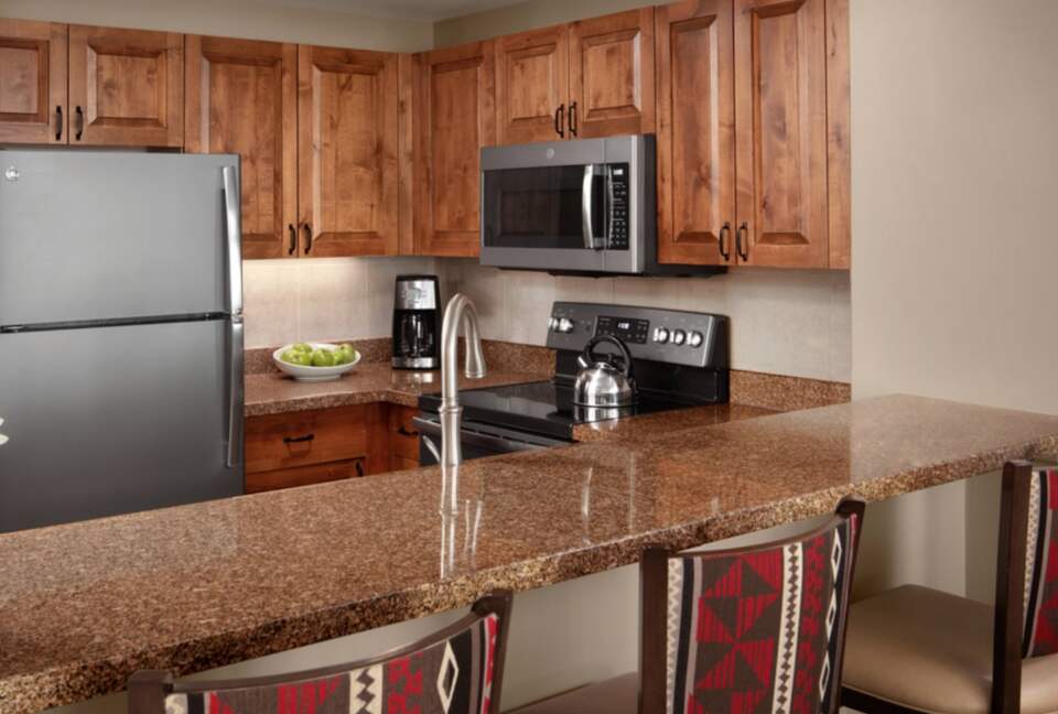 Fully equipped kitchen open to living room