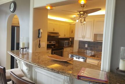 Home Exchange in Marco Island, FL barstool seating granite counters