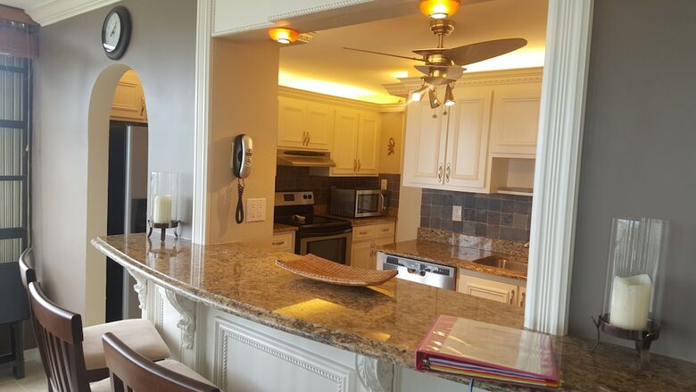 Home Exchange in Marco Island, FL barstool seating granite counters