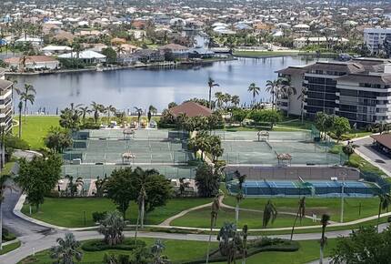 Home Exchange in Marco Island, FL tennis courts on property