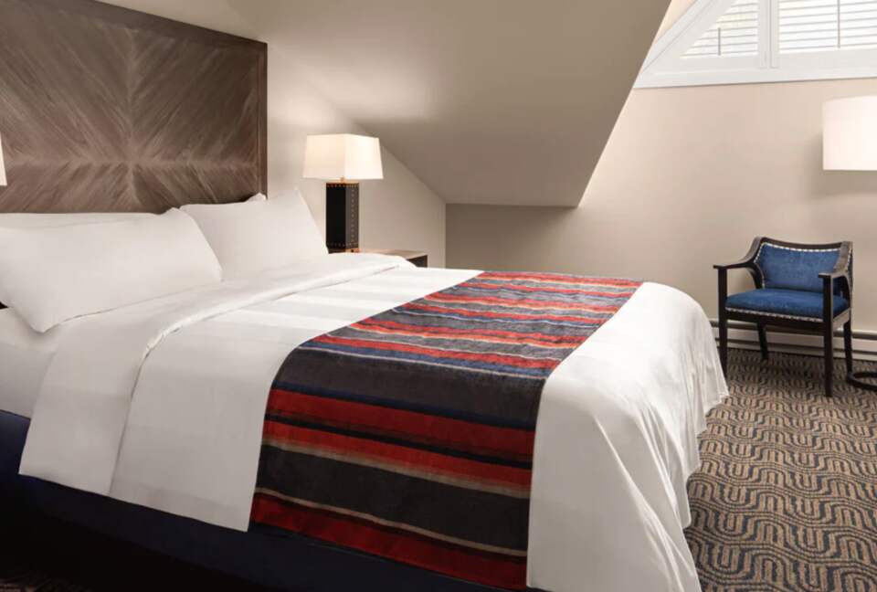 Loft bedroom with vaulted ceilings