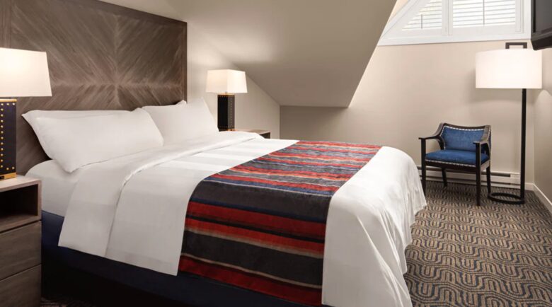 Loft bedroom with vaulted ceilings