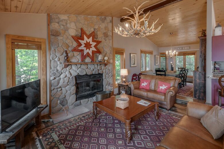 Home Exchange in Nisswa, MN, living room with stone fireplace