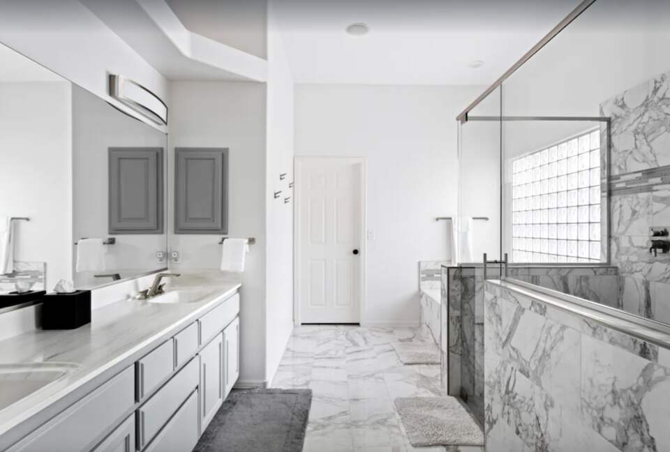 Master bathroom with marble shower