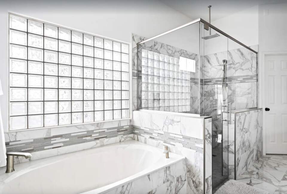 Master bathroom with marble shower