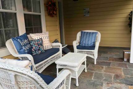Home Exchange in Amador City, CA, front porch with pond view
