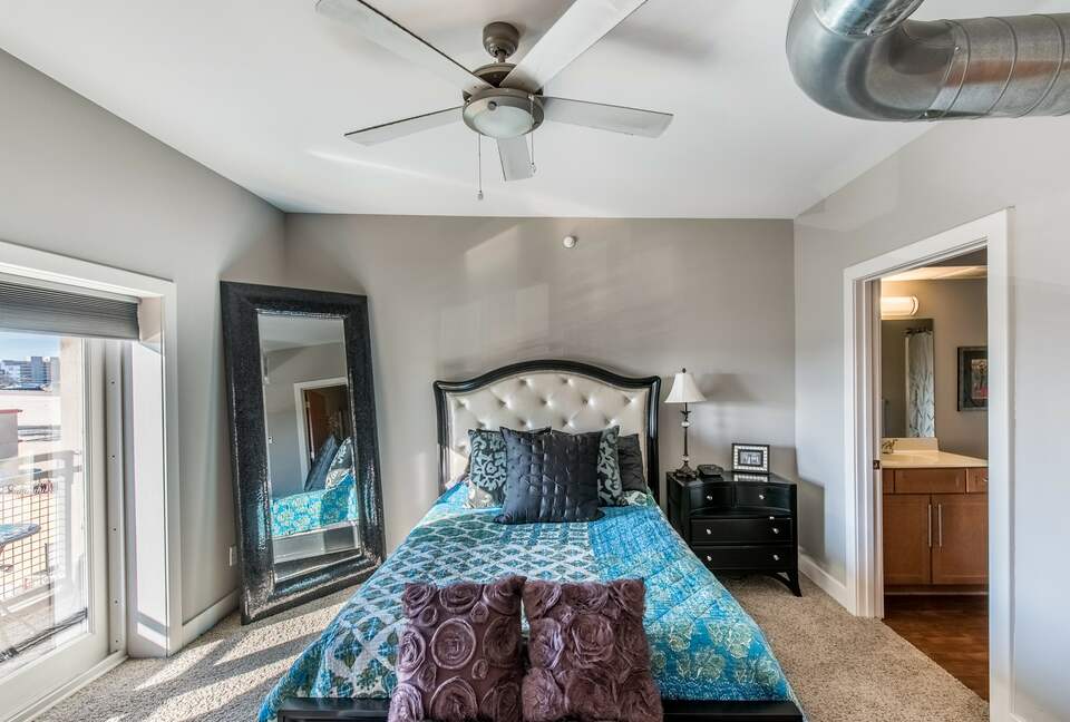 Home Exchange in Louisville, KY, master bedroom with balcony
