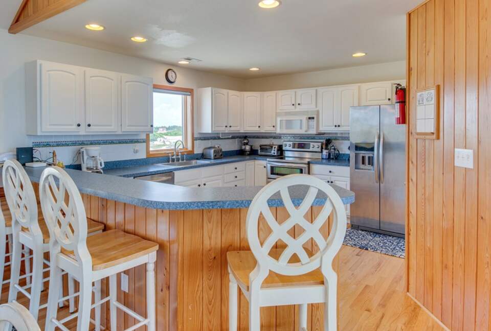 Kitchen with eat in bar