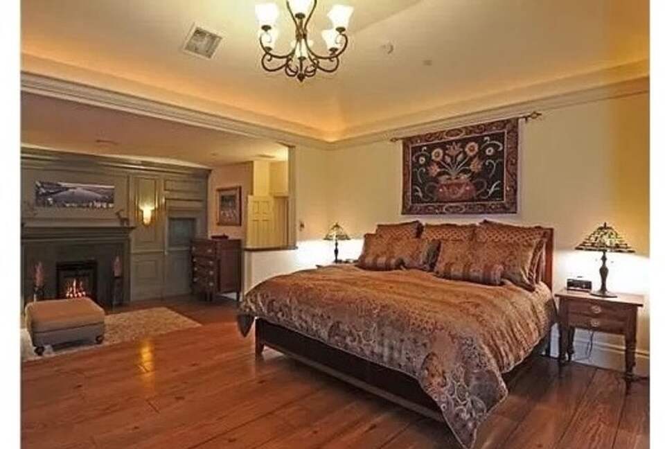 Home Exchange in Incline Village, NV, master bedroom with fireplace