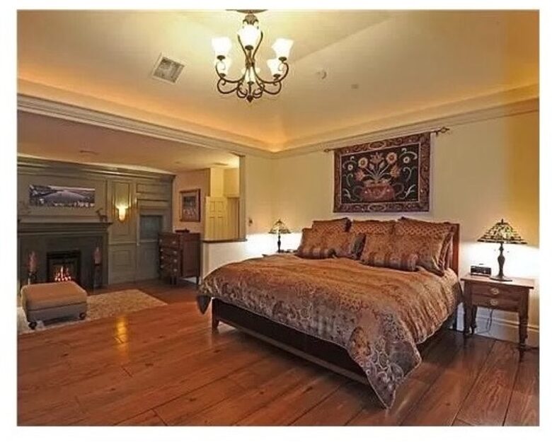 Home Exchange in Incline Village, NV, master bedroom with fireplace