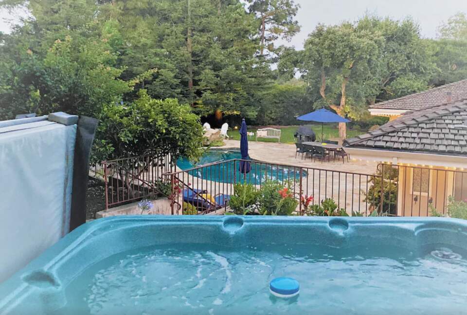 Hot tub overlooking backyard