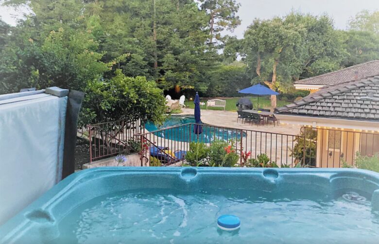 Hot tub overlooking backyard