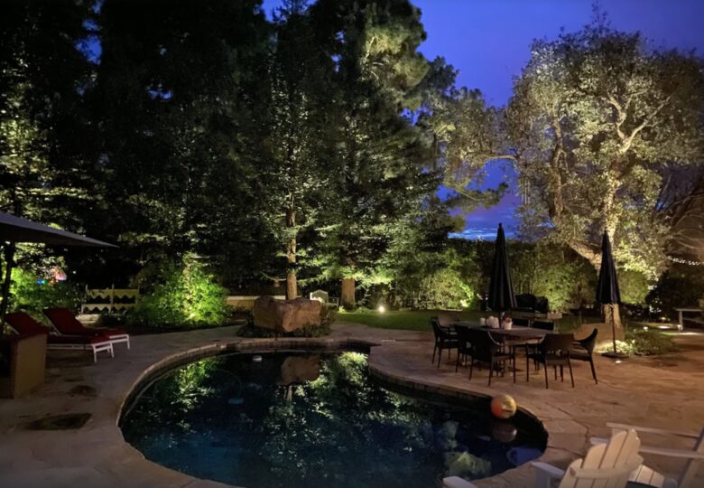Backyard pool at night