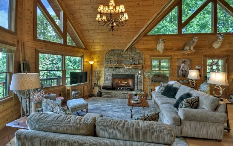 Home Exchange in Mineral Bluff, GA, living room with stone fireplace