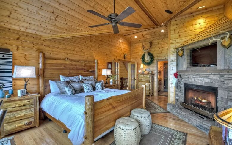 Home Exchange in Mineral Bluff, GA, master bedroom with fireplace