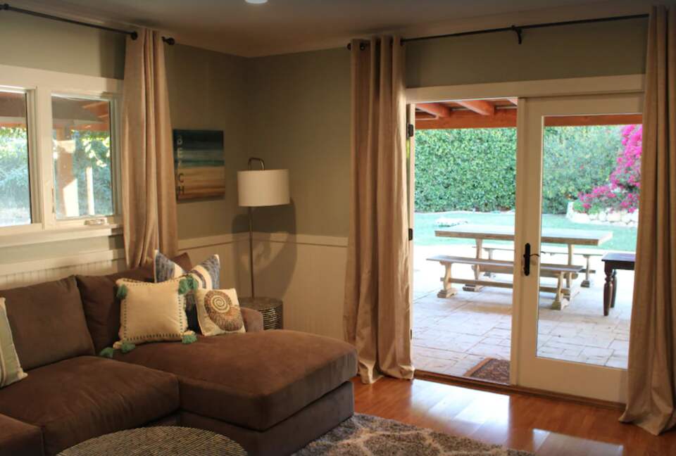 Downstairs den with French doors to backyard