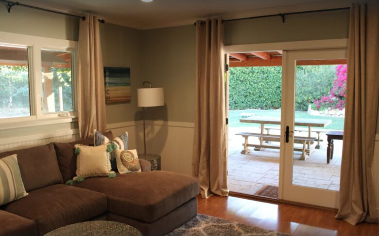 Downstairs den with French doors to backyard