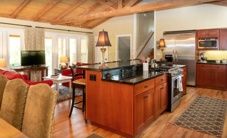 Open kitchen with eat-in bar for six