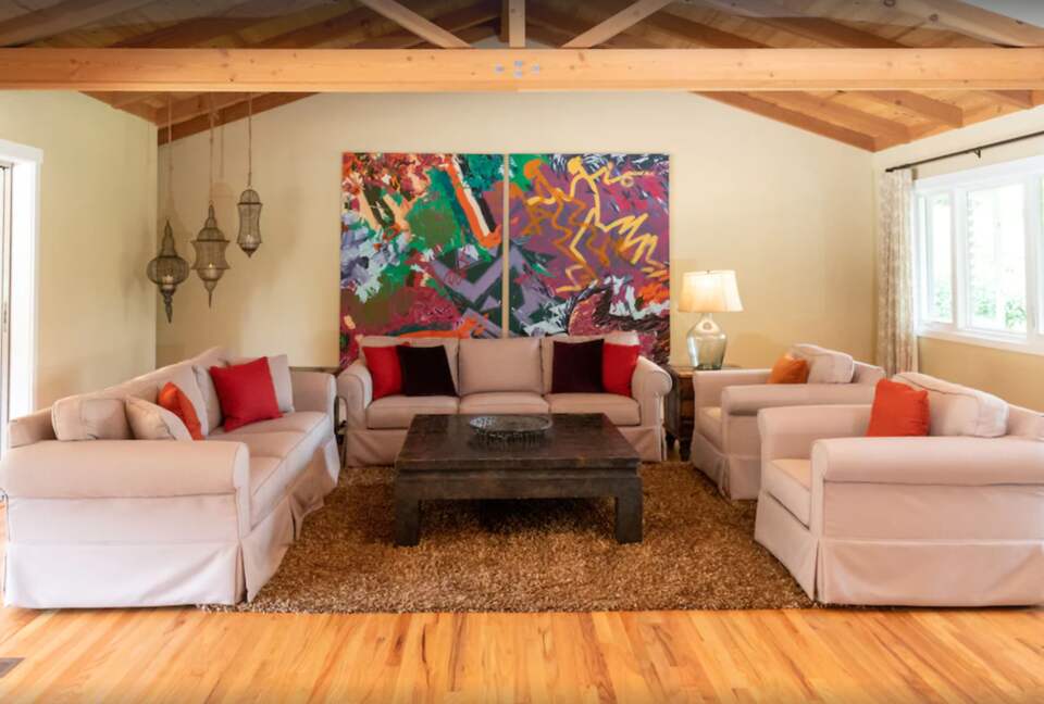 Living room with vaulted ceiling and exposed beams