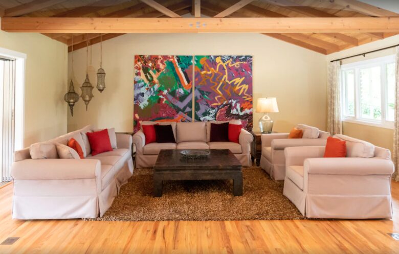 Living room with vaulted ceiling and exposed beams