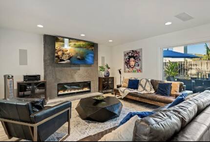 Modern, open living room with fireplace