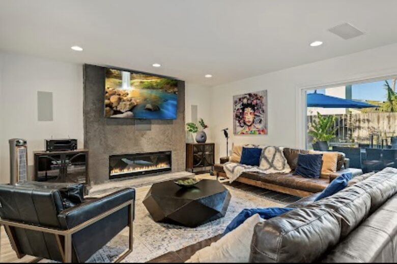 Modern, open living room with fireplace