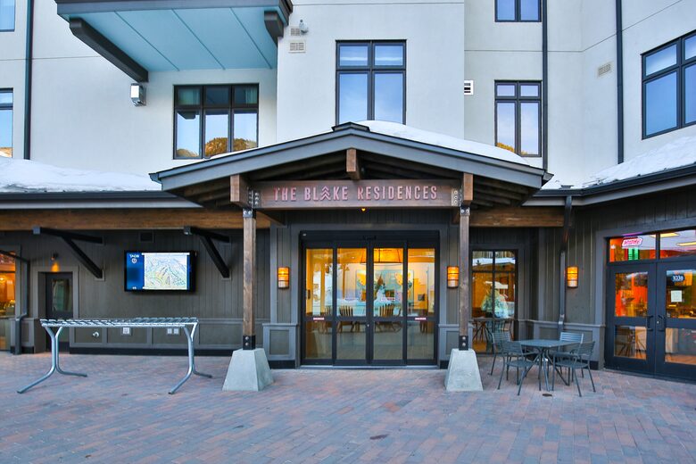 Home Exchange Taos Ski Valley, NM building front with seating