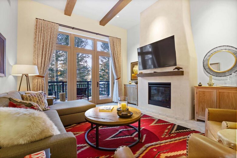 Home Exchange Taos Ski Valley, NM fireplace with high ceilings