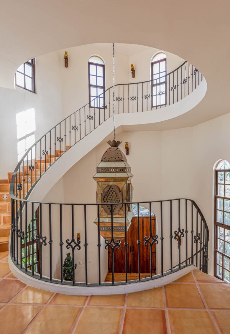 Home Exchange in Tulum, Mexico spiral staircase with detailed light
