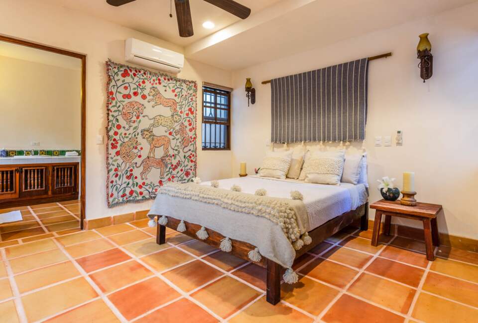 Home Exchange in Tulum, Mexico master suite with high ceilings
