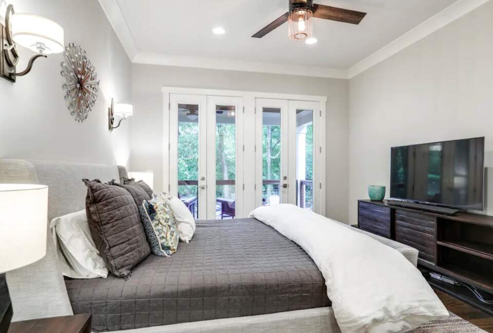 Master bedroom with doors to patio