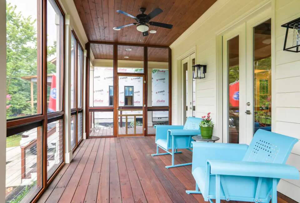 Screened-in porch and seating for two