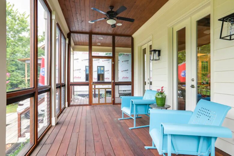Screened-in porch and seating for two