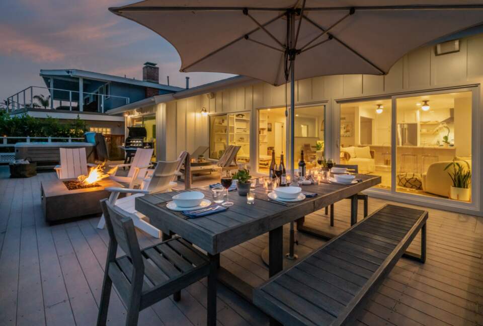 Patio and fireplace with ocean views