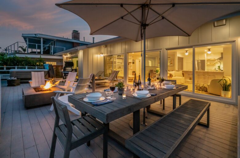 Patio and fireplace with ocean views