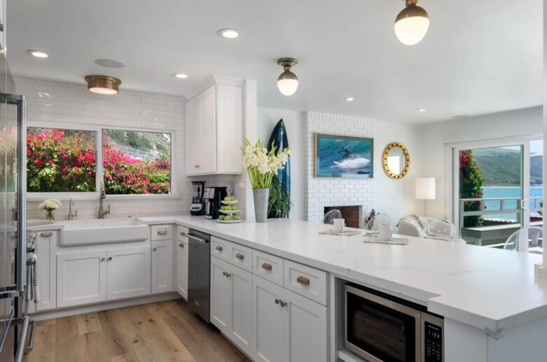 Open kitchen with stainless steel appliances