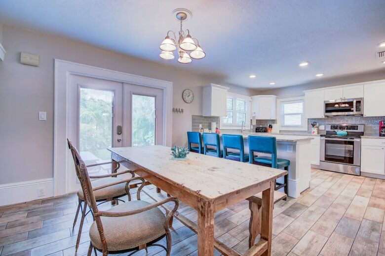 Home Exchange in Clearwater, FL triplex main kitchen with bar seats