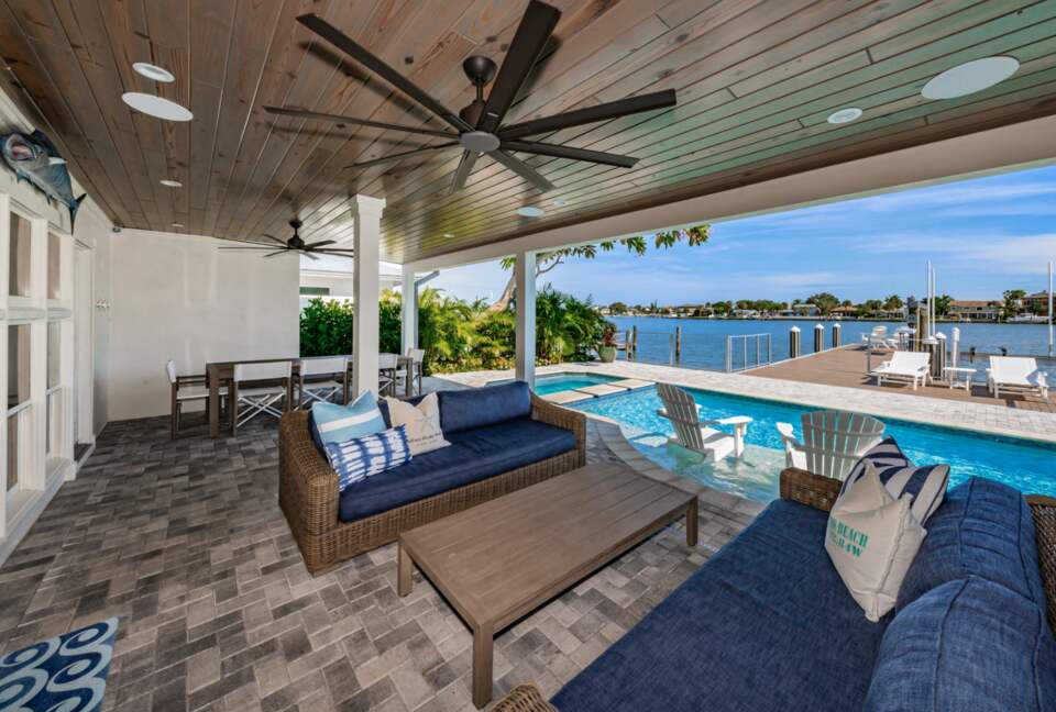 Waterfront paradise with a pool and lanai