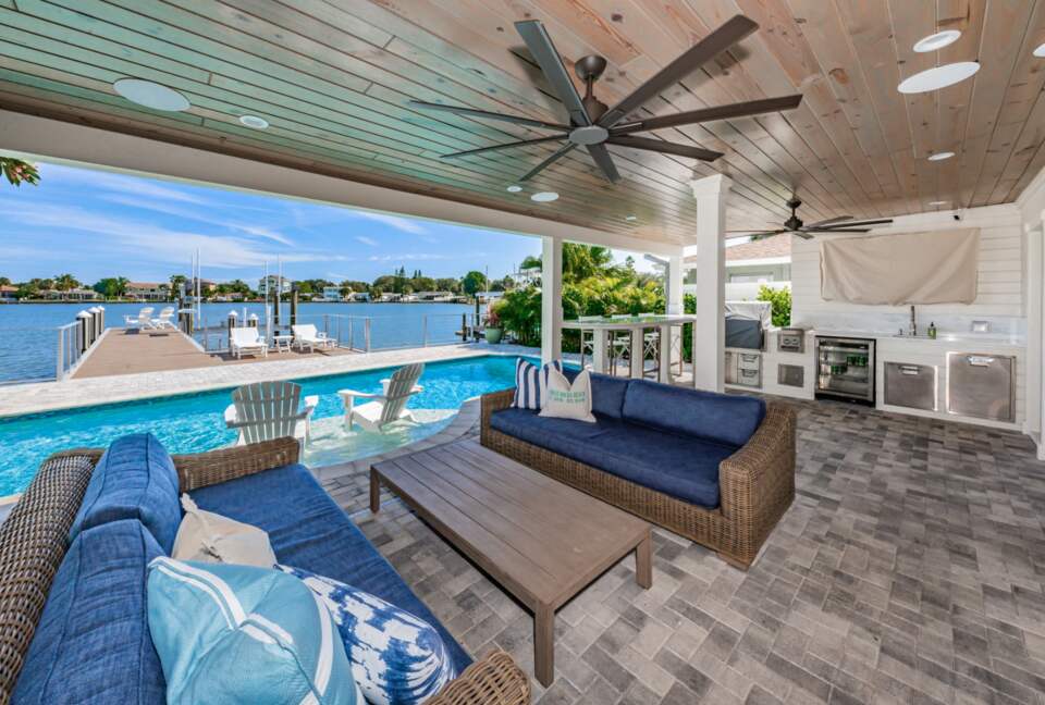 Waterfront paradise with a pool and lanai