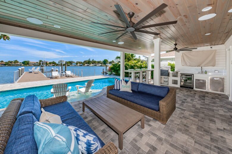 Waterfront paradise with a pool and lanai