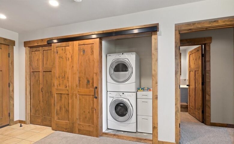 Home Exchange in Cle Elum, WA, barn doors open to laundry closet