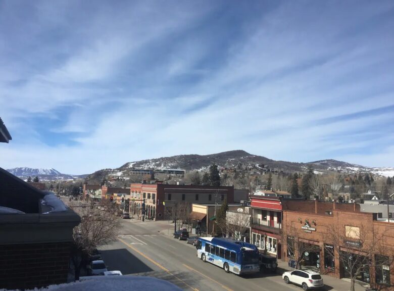 balcony view of downtown and mountains