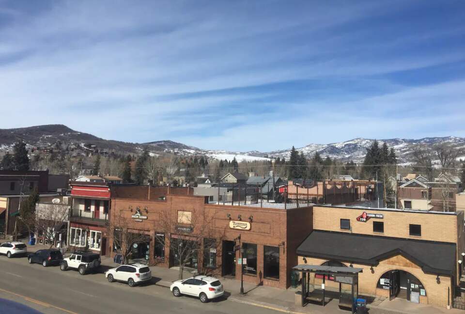 balcony view of downtown and mountains