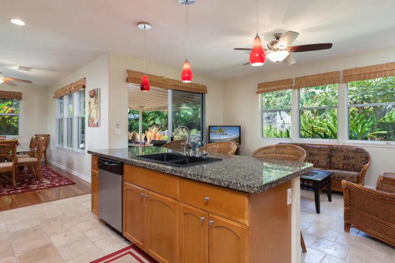 Kitchen with island open to living